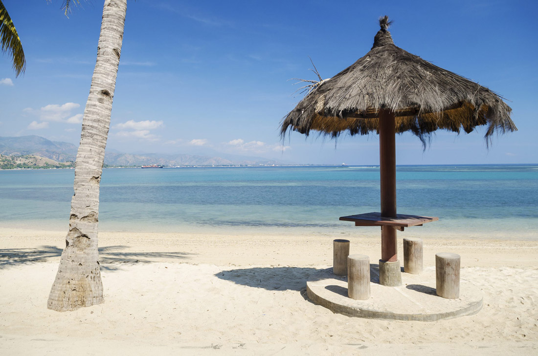 Areia Branca Beach's pristine sands near Dili, East Timor (Timor Leste).
