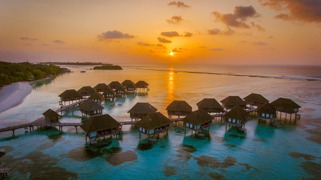 Tropical aerial view of the Maldives, a breathtaking paradise with pristine beaches and water villas.